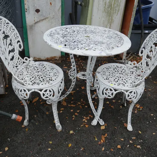 Wrought iron table and 2 chairs