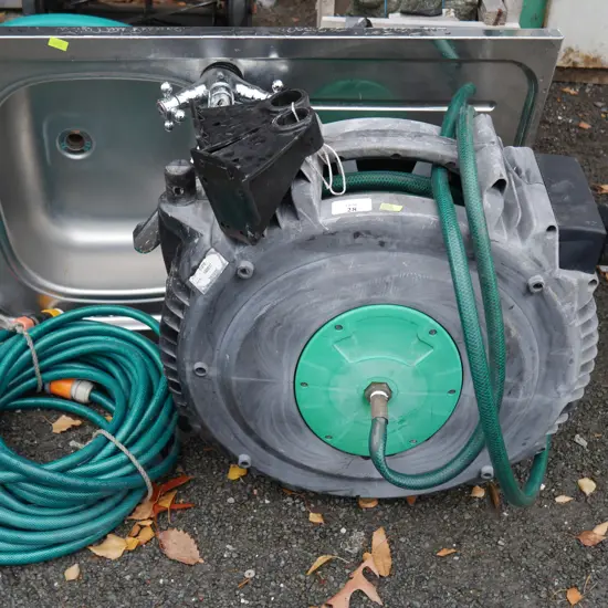 Basin, retractable hose and garden hose