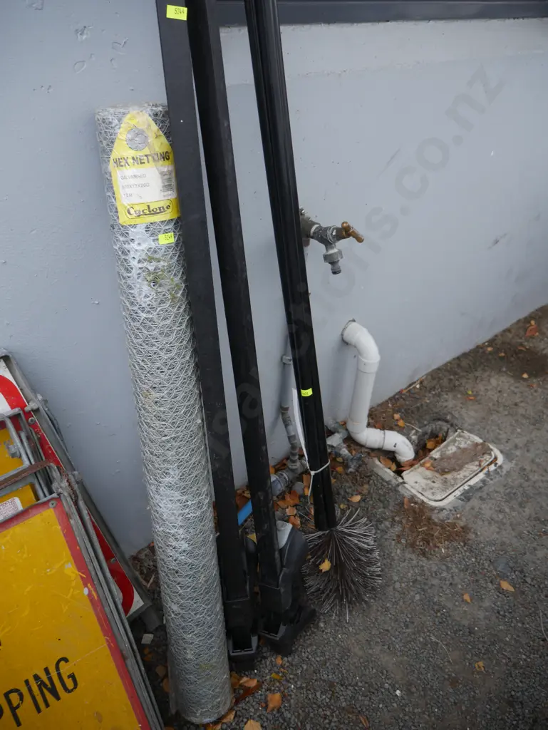 Roll of hex netting, flue brush, and roof rack Image 1++