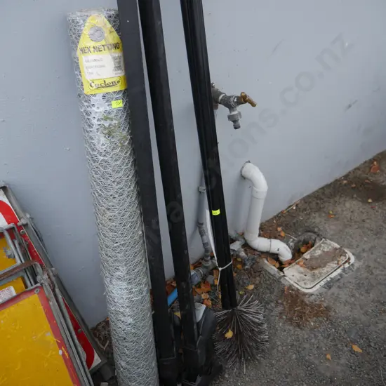 Roll of hex netting, flue brush, and roof rack