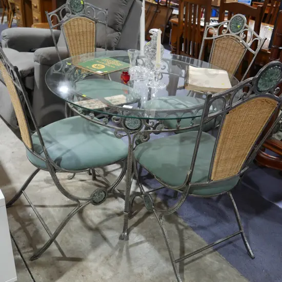 Glass top cast iron table and chairs