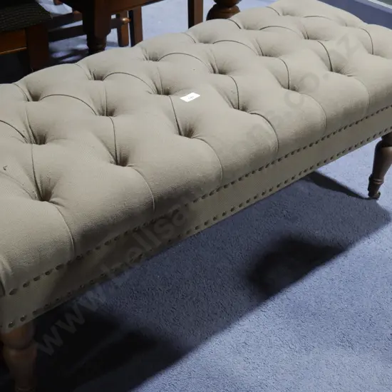 Deep buttoned ottoman