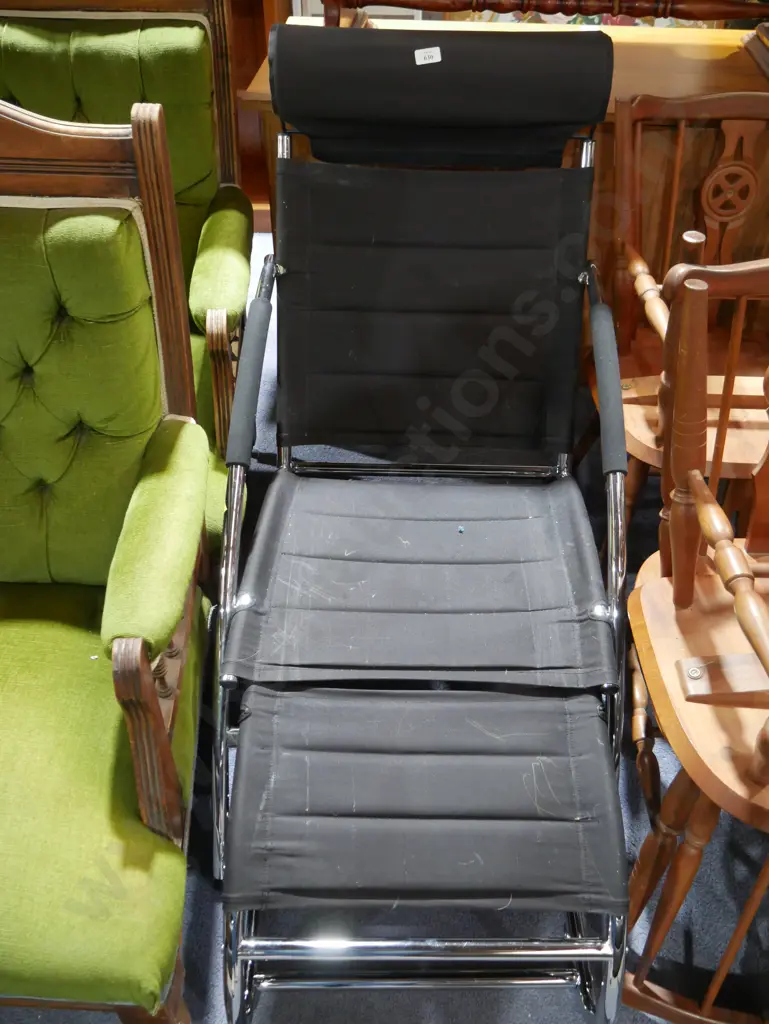 Black and chrome chair and footrest Image 1++