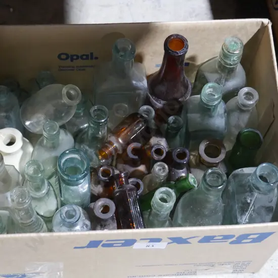 Box of old glass bottles