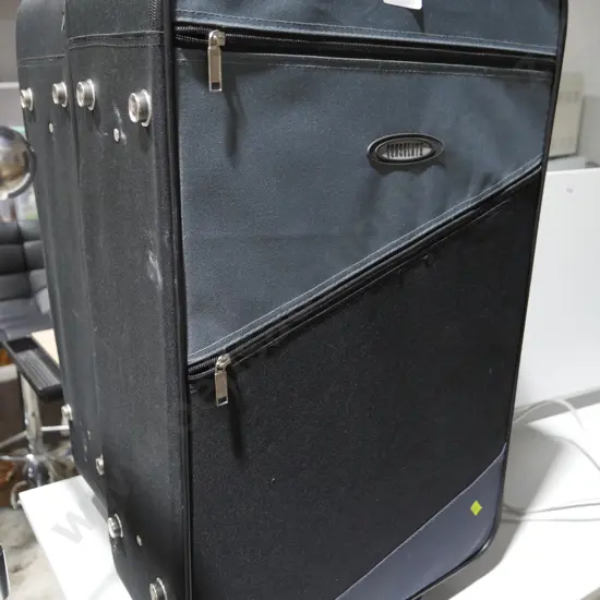 2 consulate suitcases