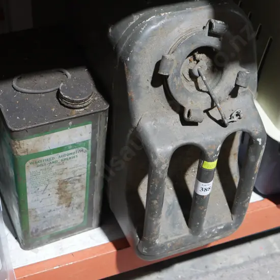 Petrol can , oil tin