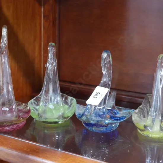 4 glass Swans