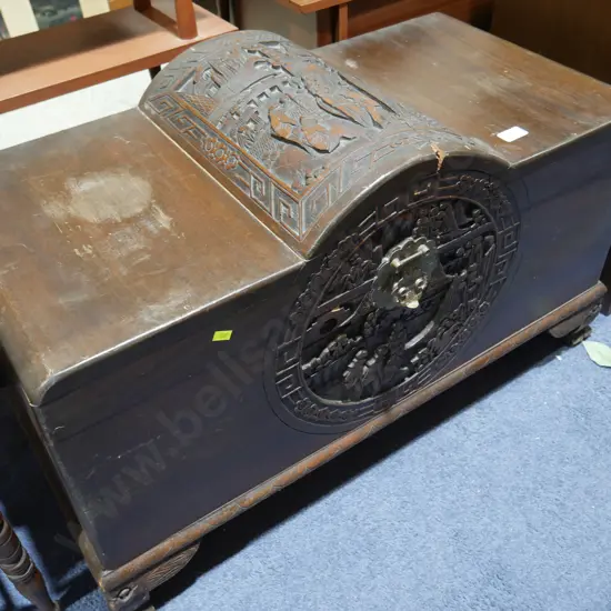 Carved wooden trunk