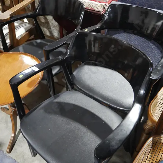 3 black dining chairs