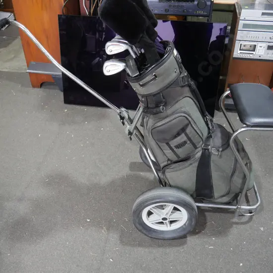 Golf clubs and trundler