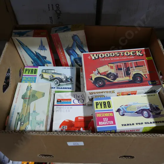 Box of model cars and planes