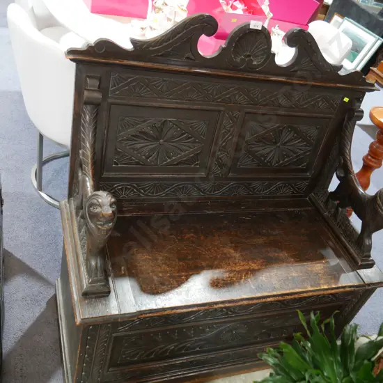 Wooden carved bench seat with storage