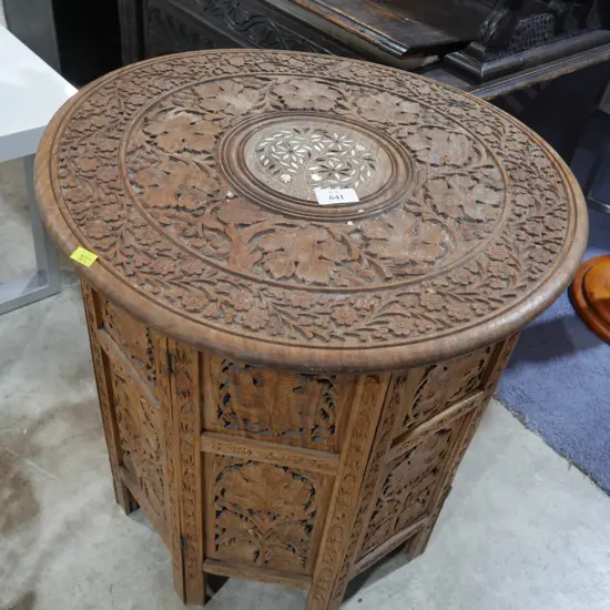 Ornate carved coffee table