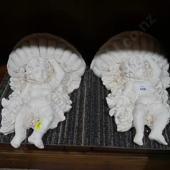 2 cherub wall hangings