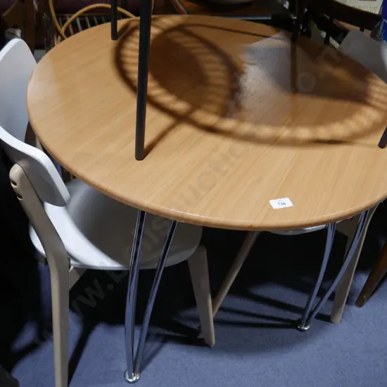 Round dining table and two chairs