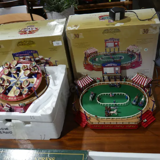 Boxed worlds fair carriage race and roundabout