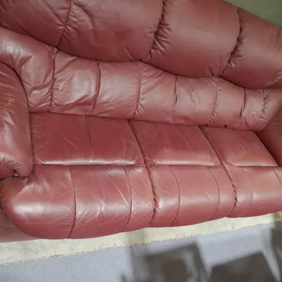 Three-seater maroon settee