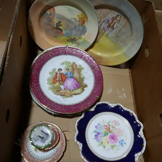 Assorted china plates