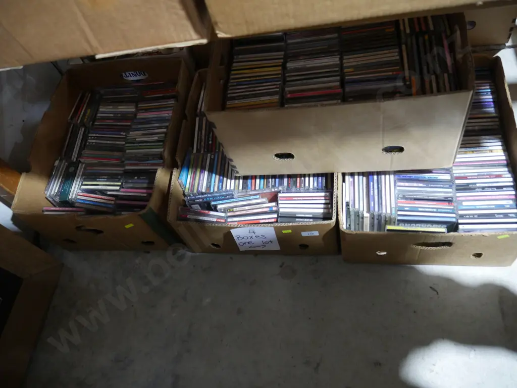 four boxes of CDs Image 1++