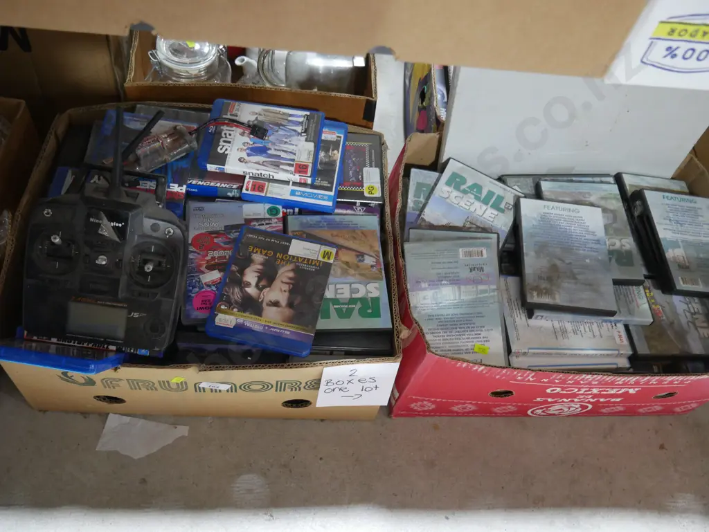 Two boxes of DVDs Image 1++