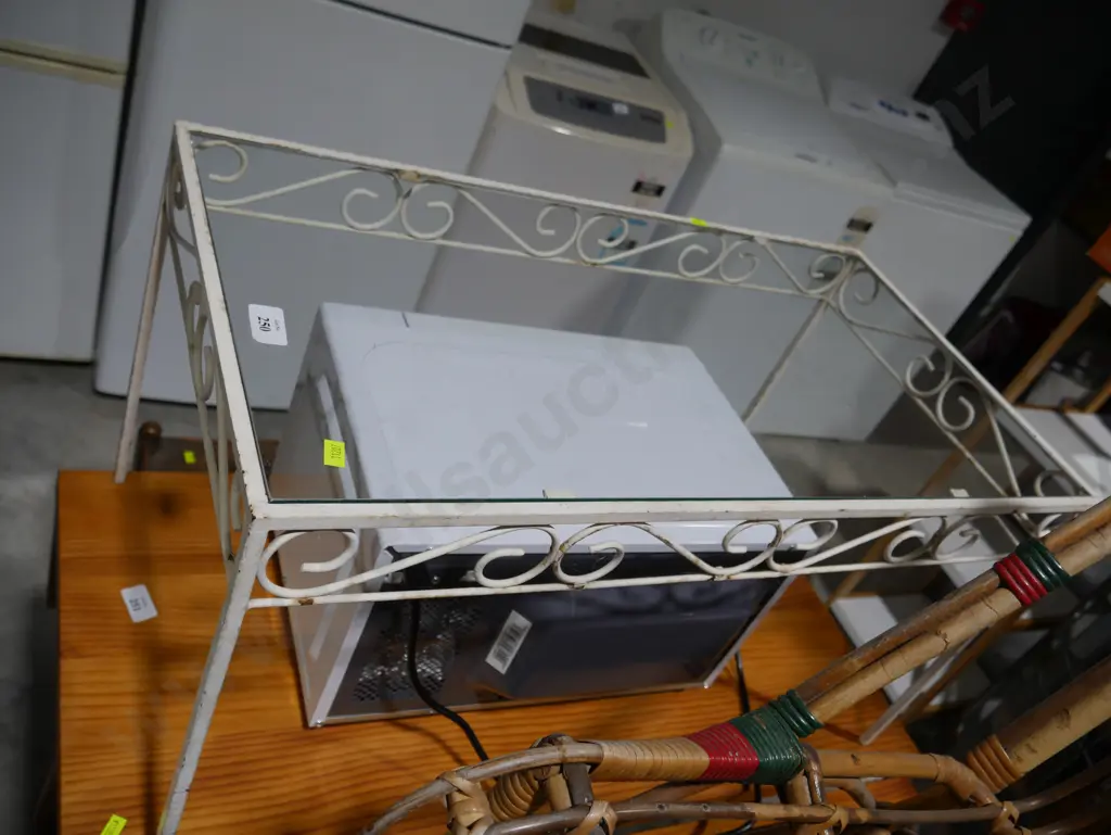 Wrought iron framed glass top coffee table Image 1++