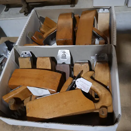 Two boxes of wood planes