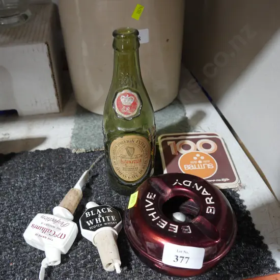 Whiskey pourers, ashtray, bottle etc