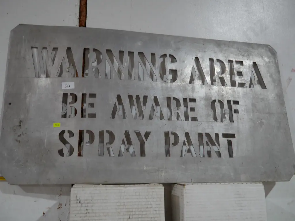 Spray paint area warning sign Image 1++