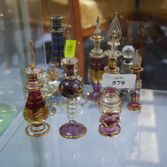 Assorted glass stopped scent bottles