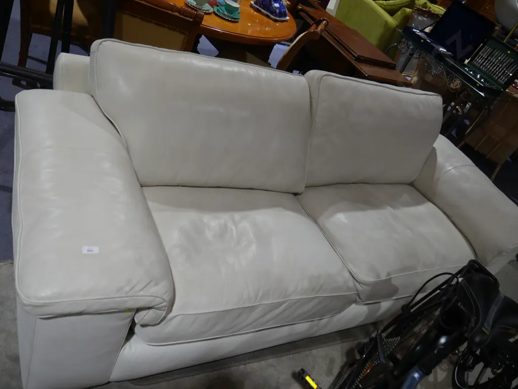 Cream leather 2 seater settee Image 1++