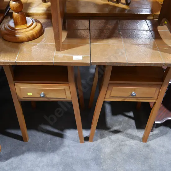 Two copper top side tables