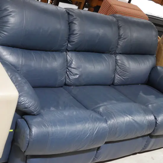 Blue leather three seater sofa