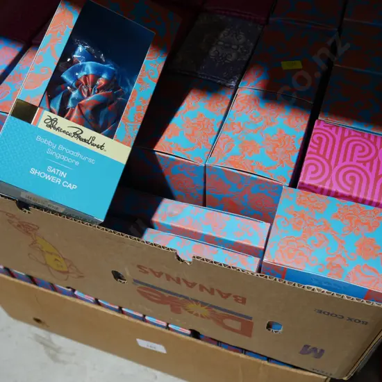 Boxed sleep masks and shower caps