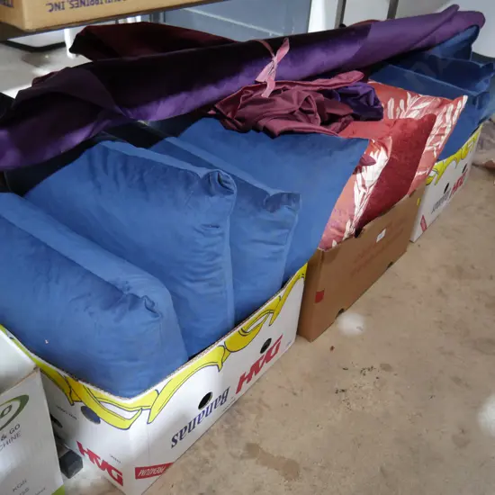 3 boxes of cushions and roles of fabric