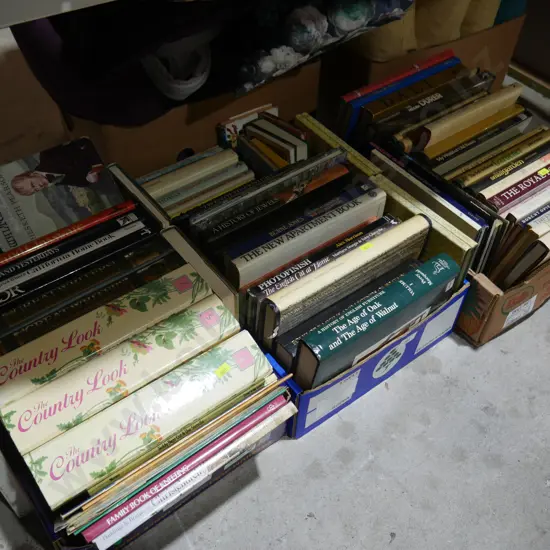 three boxes of books