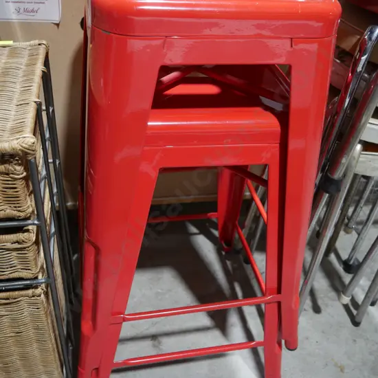Two red bar stools