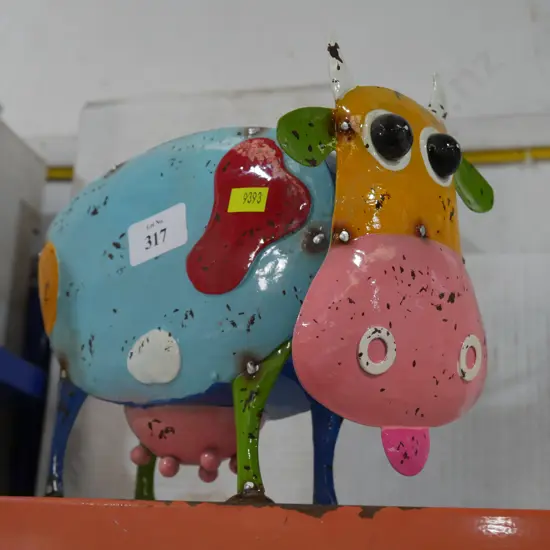 Metal garden cow ornament