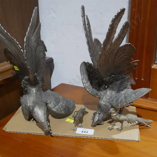 Metal bird figurines