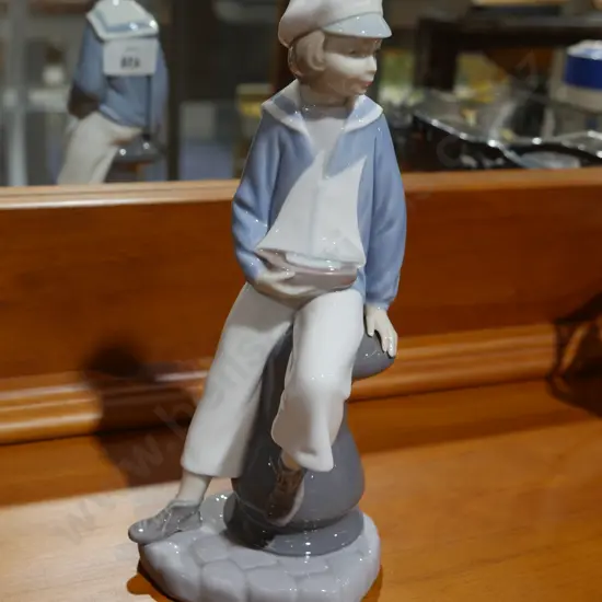 Lladro boy with sailing ship