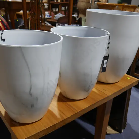 Three modern planters