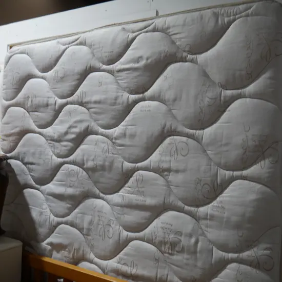 Queen-size bed and headboard