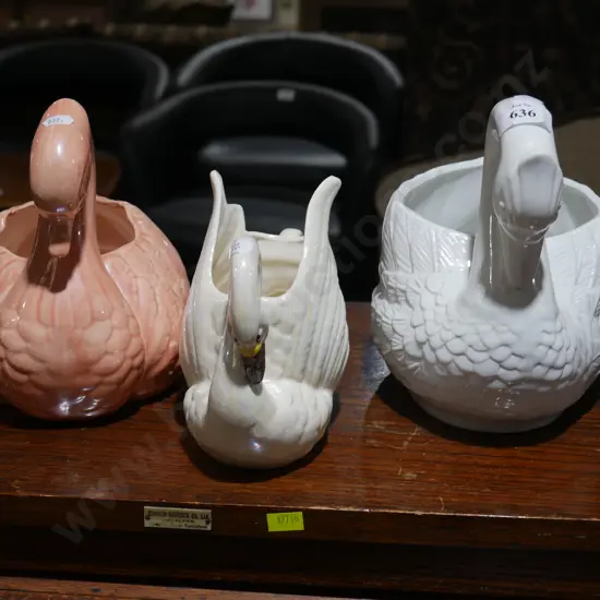 3 ceramic swans