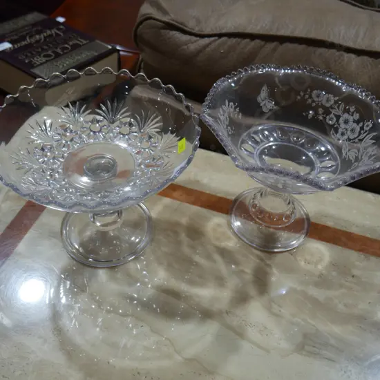2 glass footed bowls