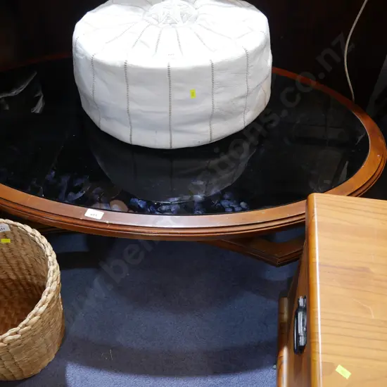 Glass topped coffee table