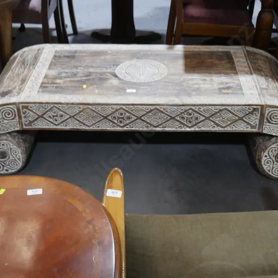 Heavy carved coffee table
