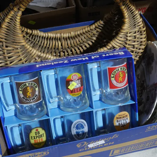Advertising beer mugs, cane basket