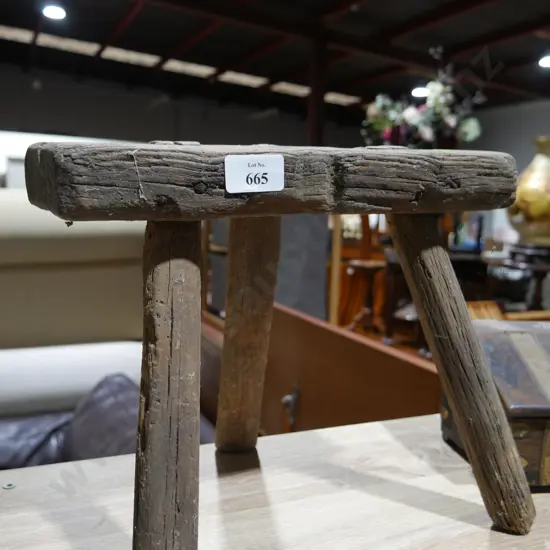 Old milking stool