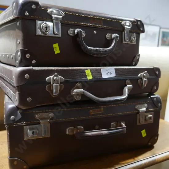 3 vintage suitcases