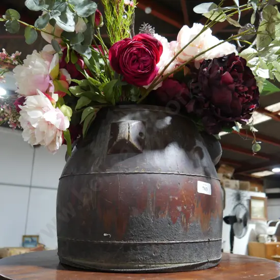 Artificial flowers in wooden vase