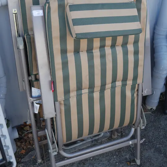 Pair folding outdoor chairs